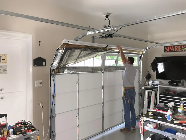Garage door section replacement by Ansonia Garage Door Repair in Ansonia