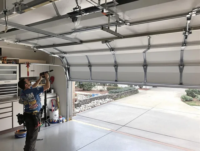 Garage door track repair service by Ansonia Garage Door Repair in Ansonia